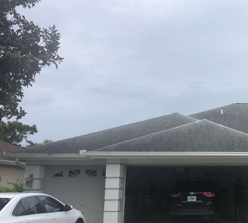 Concrete before pressure washing